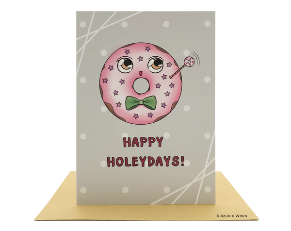Cute greeting card with a doughnut wishing Happy Holeydays | Christmas